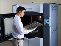 Fortus 450mc Man inspecting tray